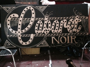 I was commissioned by Green Eye Productions to produce the branding and hand painted interior and exterior artwork for the fabulous Cabaret Noir at this years Isle of Wight Festival!